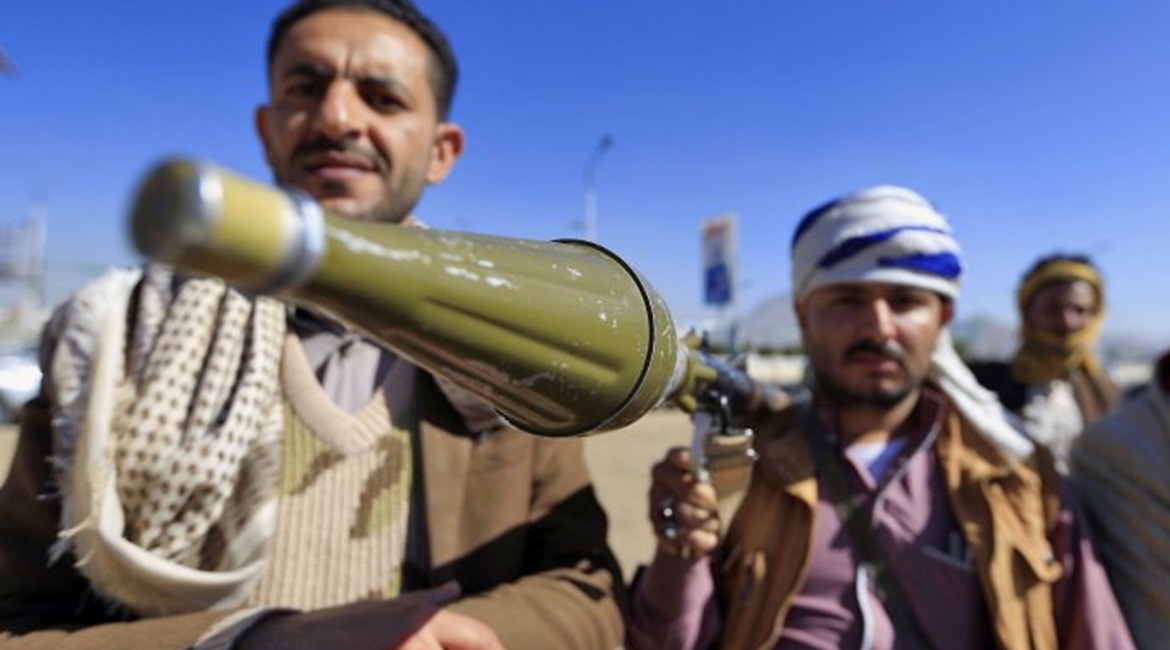 An armed Yemeni man holds a rocket launcher in the capital Sanaa to show their support for the Shiite Huthi movement against the Saudi-led intervention, in December 2018. Washington continues to debate if it will withdraw all US military support for th...