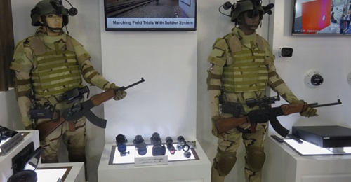 The EISS from AIO shown at IDEX 2019. Commander system is on the left and the soldier system is on the right. The control box can be seen on the belt on the right-hand side of each model.
