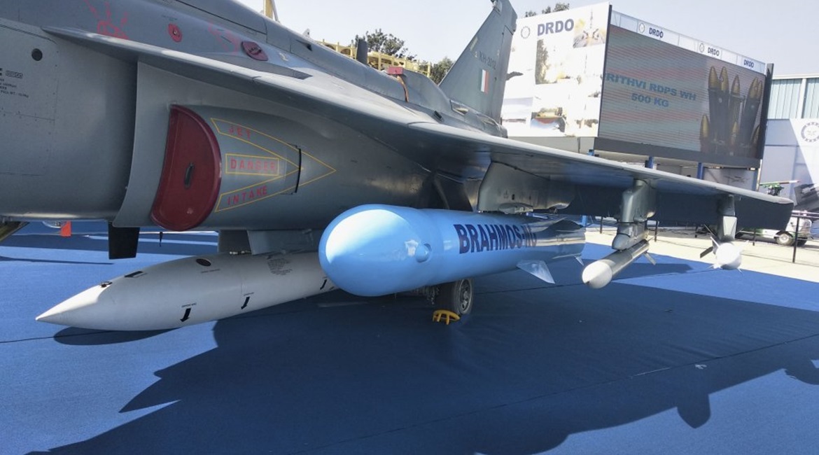 A BrahMos NG missile displayed on an underwing pylon of a Tejas LCA Mk 1 aircraft at the Aero Indian 2019 exhibition in Bangalore.