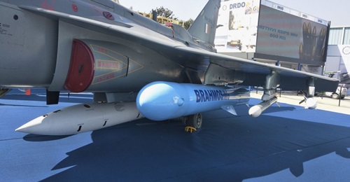 A BrahMos NG missile displayed on an underwing pylon of a Tejas LCA Mk 1 aircraft at the Aero Indian 2019 exhibition in Bangalore.