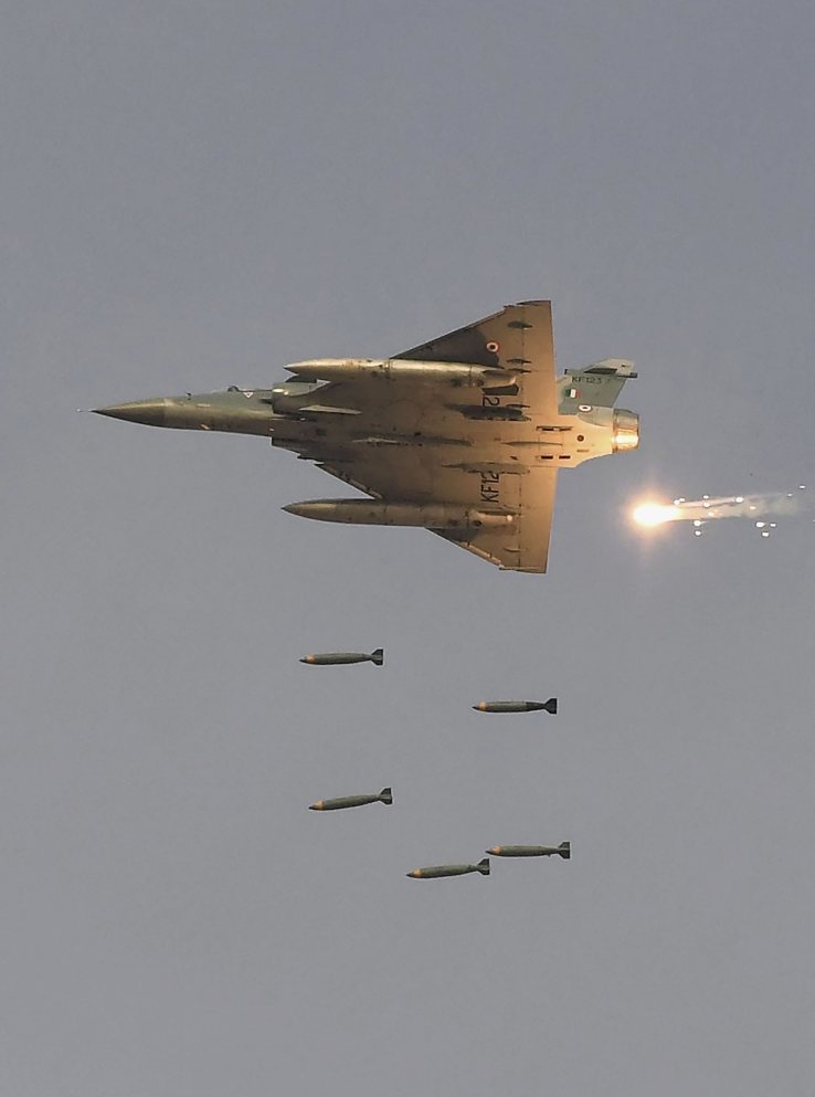An Indian Air Force Mirage 2000 drops freefall bombs during the 'Vayu Shakti 2019' firepower demonstration at the IAF's range in Pokhran, Rajasthan, on 16 February. Ten days later Indian Mirage 2000s were dropping ordnance in a live operation over Pakistan-controlled Kashmir. (Prakash Singh/AFP/Getty Images))