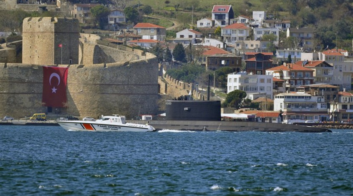 A Russian Project 636.3 'Kilo'-class diesel-electric submarine - identified by Turkish ship spotters as 
        
         - is escorted by a Turkish Coast Guard vessel as it makes a southbound transit through the Dardanelles on 15 March.