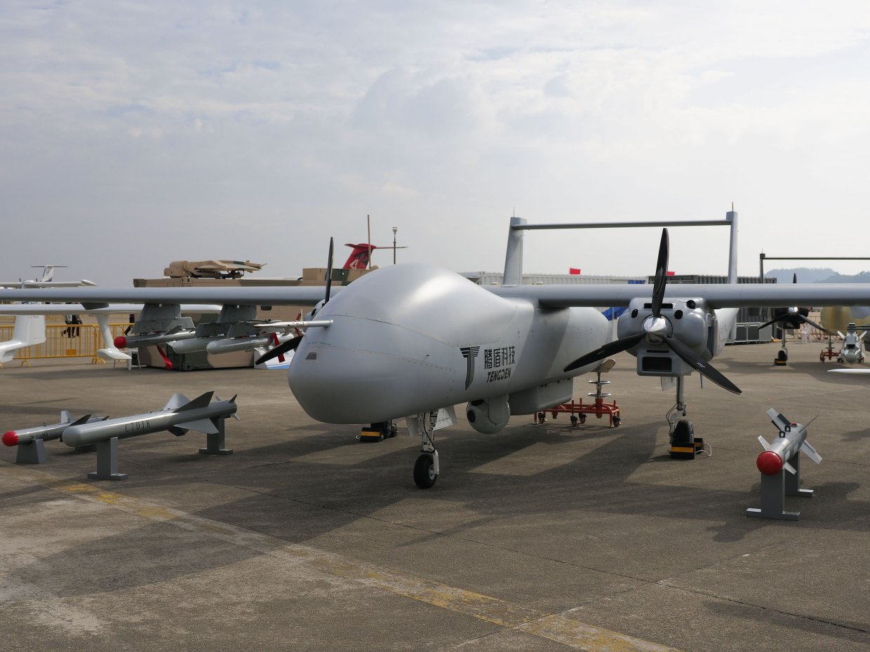The twin-engined TB001 unmanned aerial vehicle shown alongside new anti-ship and ground-attack precision munitions at Airshow China 2018. (IHS Markit/Kelvin Wong)