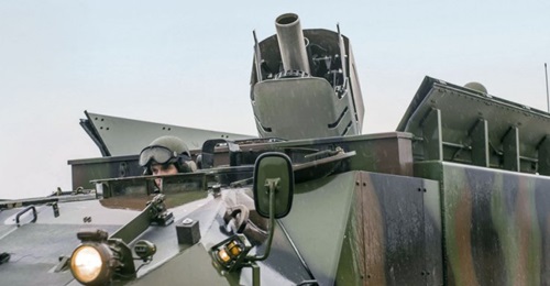 The RUAG Defence Cobra 120 mm smoothbore mortar system integrated into the rear of a GDLS-MOWAG Piranha 3+ 8×8 platform