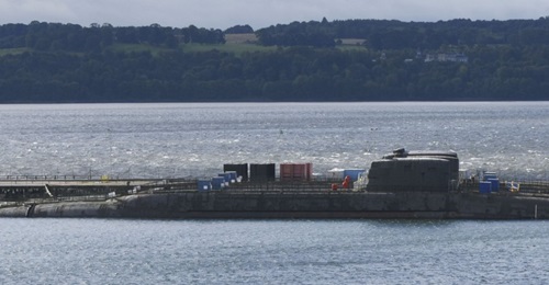 All four decommissioned Resolution-class nuclear-powered ballistic missile submarines seen laid up at Rosyth in 2016. A total of 20 ex-RN boats are awaiting dismantling.