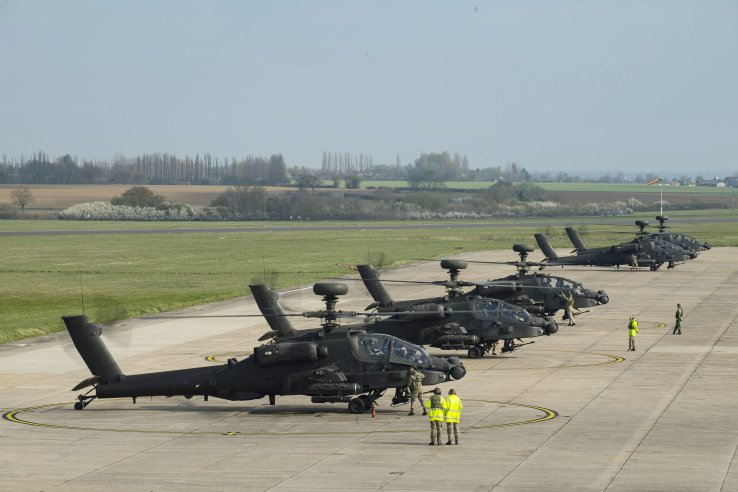 The five Apaches at their home base in Wattisham shortly before departing for Estonia. They are joined in their deployment by four Lynx Wildcats. (Crown Copyright)
