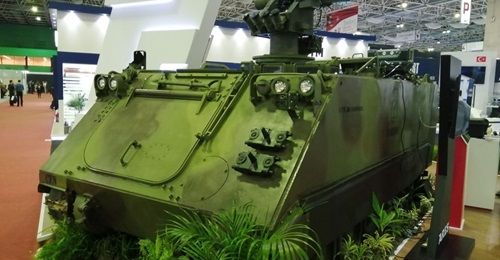 An M113 MB1 APC is shown with the REMAX III weapon station and Sentinel and IronVision systems.