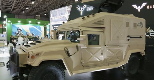 The Armadillo TA-2 70 mm weapon system mounted on a modified M1152 HMMWV 4 × 4 tactical vehicle
