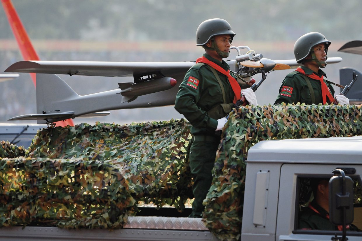 During a military parade held on 17 April the UWSA displayed recently acquired equipment, including an unmanned aerial vehicle carried on the back of a truck. (Ye Aung Thu/AFP/Getty Images)