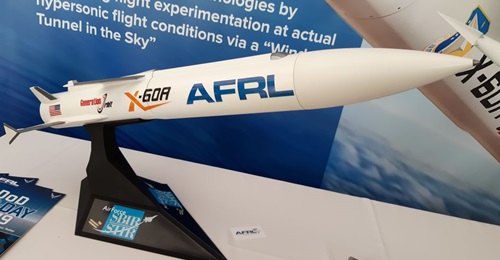 A model of the X-60A on display at AFRL's Lab Day at the Pentagon on 25 April 2019. The silver nosecone in the lower right of the photo is the nose tip from a different hypersonic test flight called HiFire-5.