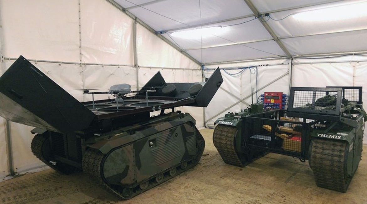 The two configurations of the THeMIS that participated in Exercise 'Autonomous Warrior': the one on the left is equipped with the KX-4 LE Titan unmanned aerial vehicle (UAV) while the one on right is the logistics version that can carry a payload of 75...