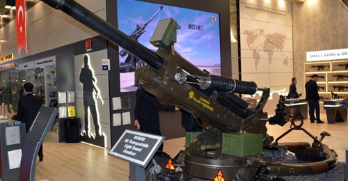 MKEK's Air Transportable Light Towed Howitzer from the front, showing Aselsan's muzzle velocity radar mounted above the 105 mm/30 calibre ordnance.