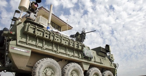 A Stryker with the 5 kW Mobile Experimental High Energy Laser, mounted on the vehicle's rear, during the Maneuver Fires Integrated Experiment at Fort Sill, in April 2017.