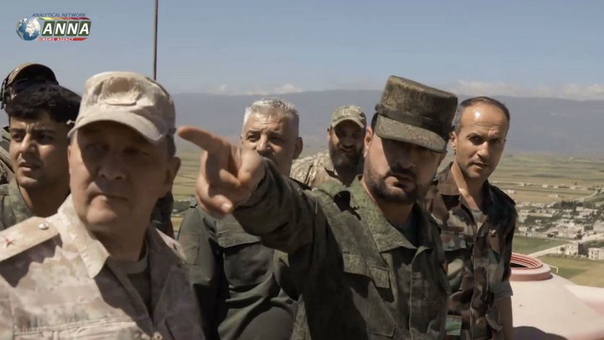 A still from footage released by Russia’s ANNA news agency on 20 May shows Syria’s General Suheil al-Hassan inspecting the front in northwest Syria with an unidentified Russian major general. (ANNA)