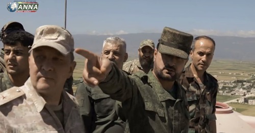 A still from footage released by Russia's ANNA news agency on 20 May shows Syria's General Suheil al-Hassan inspecting the front in northwest Syria with an unidentified Russian major general.