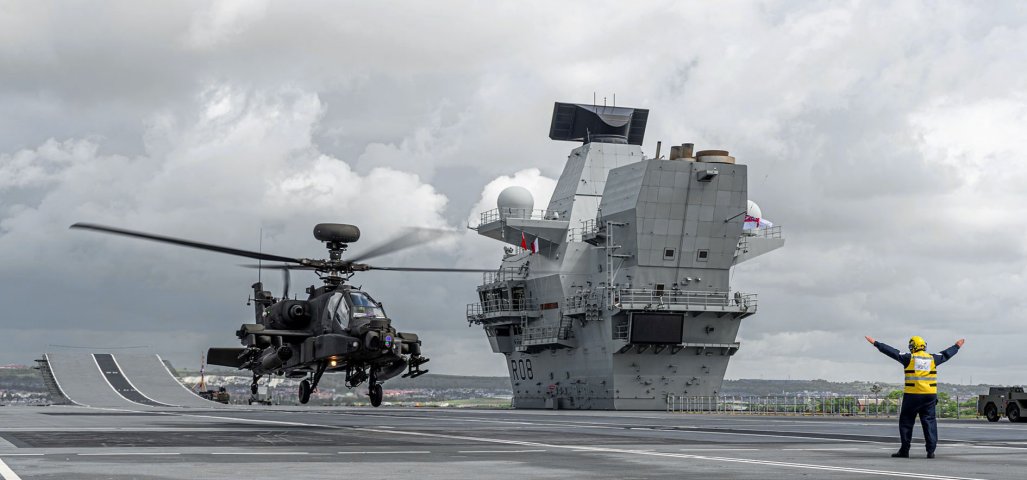 
        A British Army Apache AH1 landed on HMS
        Queen Elizabeth
        for the first time on 3 June. The UK has committed the carrier to NATO’s Readiness Initiative.
       (Crown Copyright)