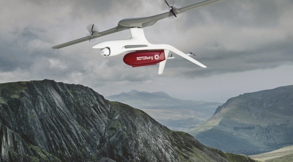 DZYNE Technologies' ROTORwing UAV uses its whole wing to launch and land vertically before transitioning into forward flight. The gray legs on the front of the aircraft that allow vertical take-off and landing tilt back before forward flight to minimis...