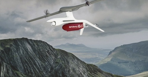 DZYNE Technologies' ROTORwing UAV uses its whole wing to launch and land vertically before transitioning into forward flight. The gray legs on the front of the aircraft that allow vertical take-off and landing tilt back before forward flight to minimis...