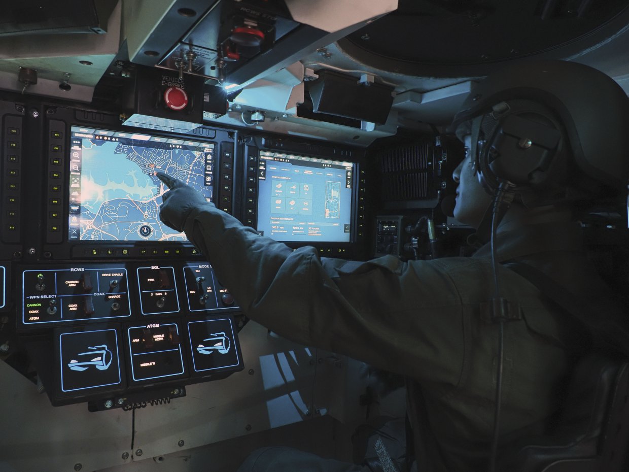 The new Hunter armoured fighting vehicle features a 'Combat Cockpit' that is inspired by an aircraft's cockpit, with all critical vehicle functions within immediate reach of the crew. (IHS Markit/Kelvin Wong)