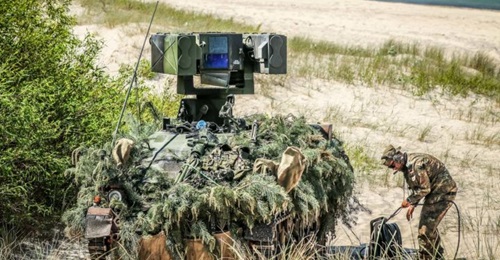 An Aufklärungs-, Führungs- and Feuerleitfahrzeug (reconnaissance, command, and fire control vehicles, AFF) of the third squadron of the Luftwaffe's Flugabwehrraketengruppe (Surface-to-Air Missile Group) 61 during 'Tobruq Legacy 2019' being he...