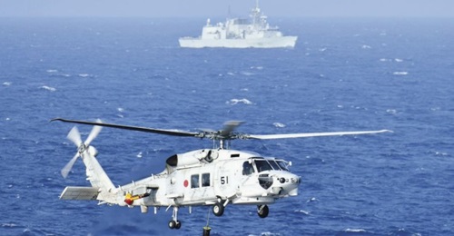 The JMSDF conducting interoperability  exercises with the RCN in the South China Sea in June.