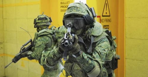 SAF troops breaching a building during an urban operations training exercise. Singapore has announced new measures to boost military response to terror attacks.
