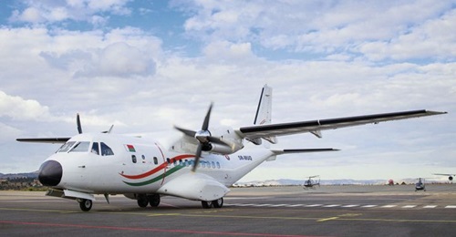 Madagascar's new CN235 transport aircraft and two of the three AS350B2 helicopters are seen during the official handover ceremony at Ivato International Airport on 24 June.