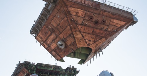 Newport News Shipbuilding completed the aircraft carrier 
        
         primary hull with an upper bow superlift.