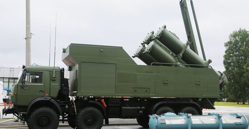 The Typhoon JSC Research and Production Enterprise Rubezh-ME mobile anti-ship missile system is shown here with a canistered Kh-35UE round in the foreground.