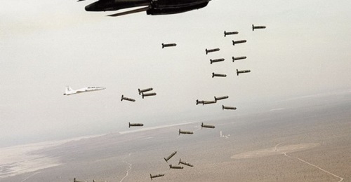 A B-1B bomber dropping cluster munitions during tests. The USAF is replacing this class of weapon that spreads live bomblets across a large area with a family of next-generation bombs that use fragmentation to achieve the same effect.