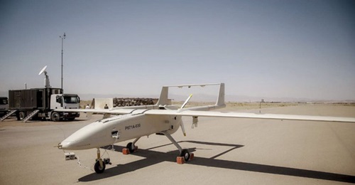 A Mohajer-6 is seen with its control vehicle in the background at an airstrip that is probably near Gonabad in northeast Iran.