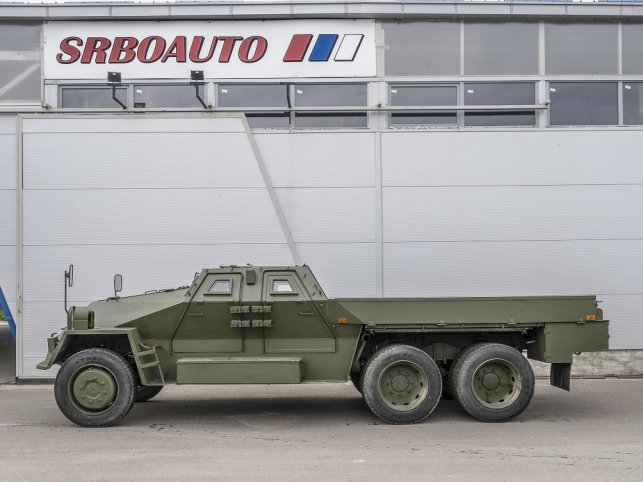 The upgraded Praga VS35, showing the new four-door protected cab. The flatbed’s sides fold down to fit the twin 30 mm weapons. (Srboauto)