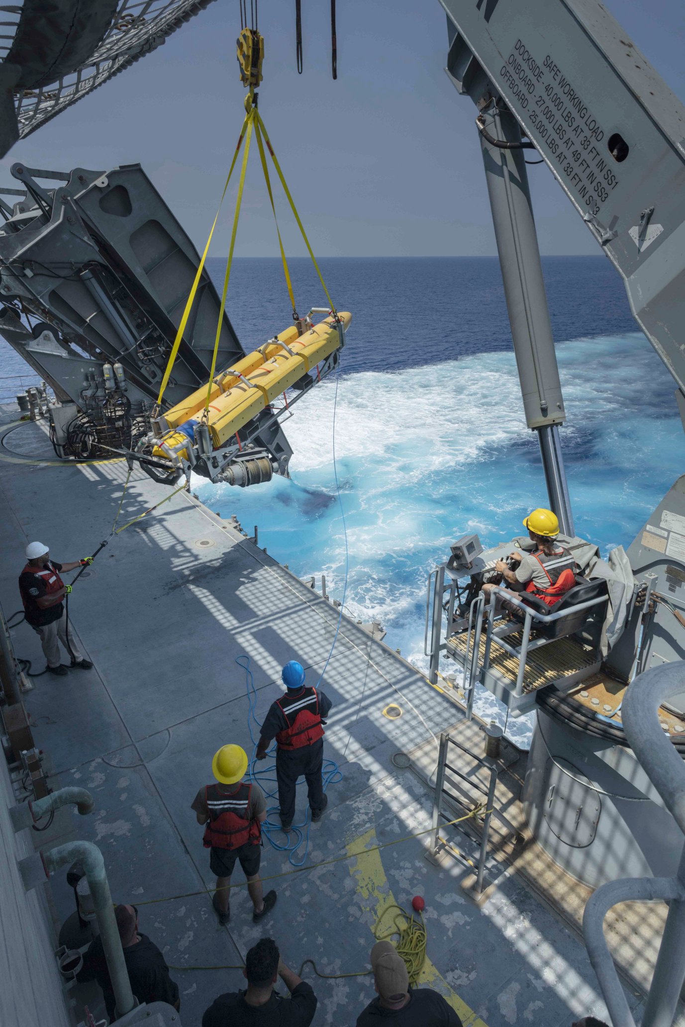 
        The Knifefish autonomous underwater vehicle seen being deployed from the expeditionary fast transport vessel USNS
        Spearhead
        .
       (US Navy)