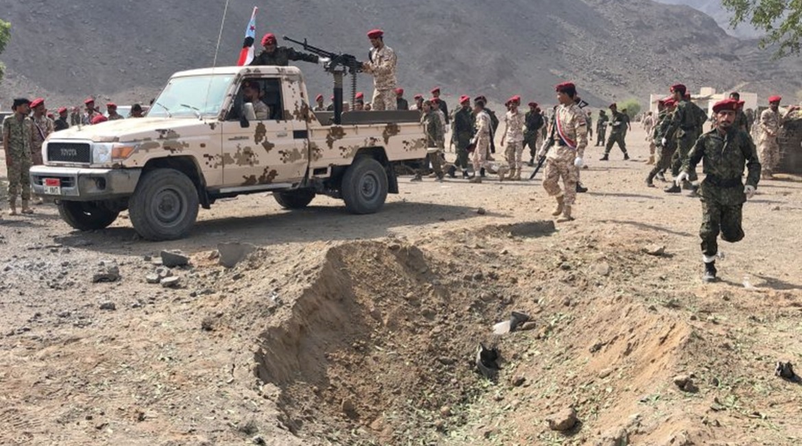 A crater that was more likely caused by a ballistic missile than a Qasef-2K is seen in the aftermath of the 1 August attack on Camp Jalala in the Little Aden area west of Aden port.