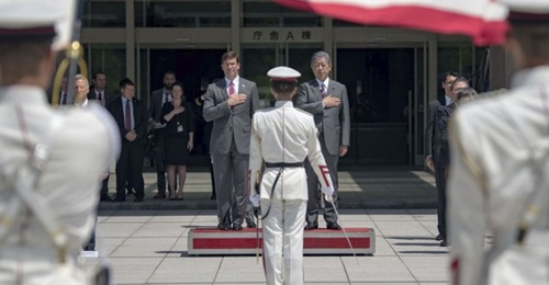 US Defense Secretary Mark Esper stands with Japanese Defense Minister Takeshi Iwaya in Tokyo on 7 August.