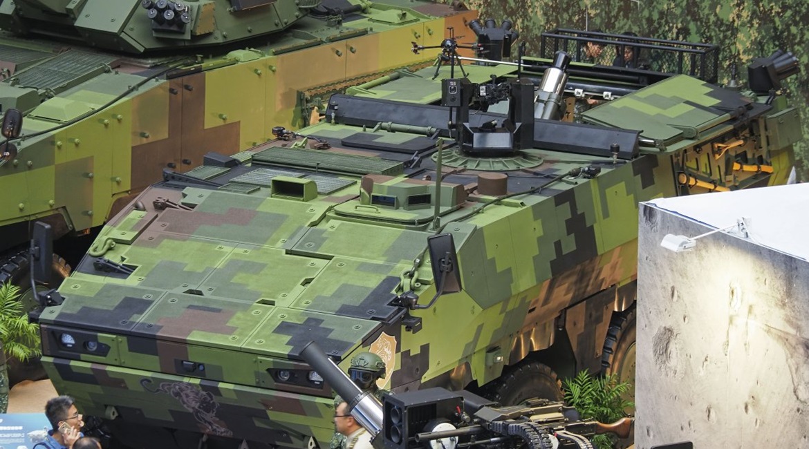 The 81 mm Mobile Mortar System seen integrated to the prototype 8×8 M2 Mortar Carrier, which is under development by the MND Materiel Production Center's 209th Arsenal. Its UAV-based forward-targeting system can be seen on its portside roof hatch.