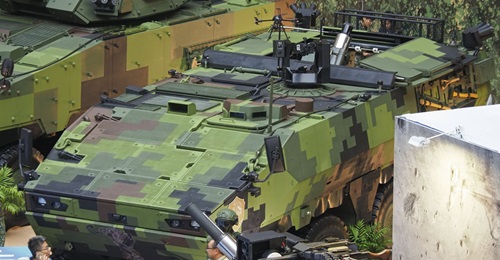 The 81 mm Mobile Mortar System seen integrated to the prototype 8×8 M2 Mortar Carrier, which is under development by the MND Materiel Production Center's 209th Arsenal. Its UAV-based forward-targeting system can be seen on its portside roof hatch.