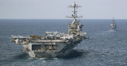 The US Navy Nimitz-class aircraft carrier USS Harry S Truman and elements of its carrier strike group (CSG) are pictured during the CSG's recent COMPTUEX. COMPTUEX processes have helped the US Second Fleet achieve FOC by building force generation capac...