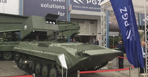 A BWP-1 amphibious tracked infantry fighting vehicle in tank destroyer configuration, equipped with a cassette of 12 Brimstone precision strike missiles at MSPO 2019 in Poland.