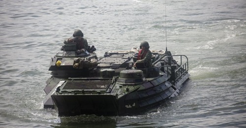 Philippine and US marines drive a Philippine assault amphibious vehicle onto BRP 
        
         (LD-602) in Subic Bay, Philippines, in late-August.