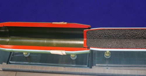 A cutaway model showing the Kingfisher round's internal components, including fuze, expulsion charge, and submunition.