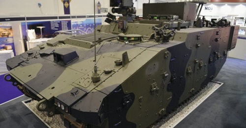 The Athena C2 variant of the Ajax AFV family. It can be distinguished from the Ares APC by the raised superstructure and large box on the roof of the vehicle.