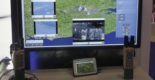 The L3Harris Technologies network control system for manned/unmanned teaming demonstrated at DSEI 2019. The images on the left of the situational awareness map are sensors from two attack helicopters, the image in the middle is from an L3 Wescam MX-10 ...