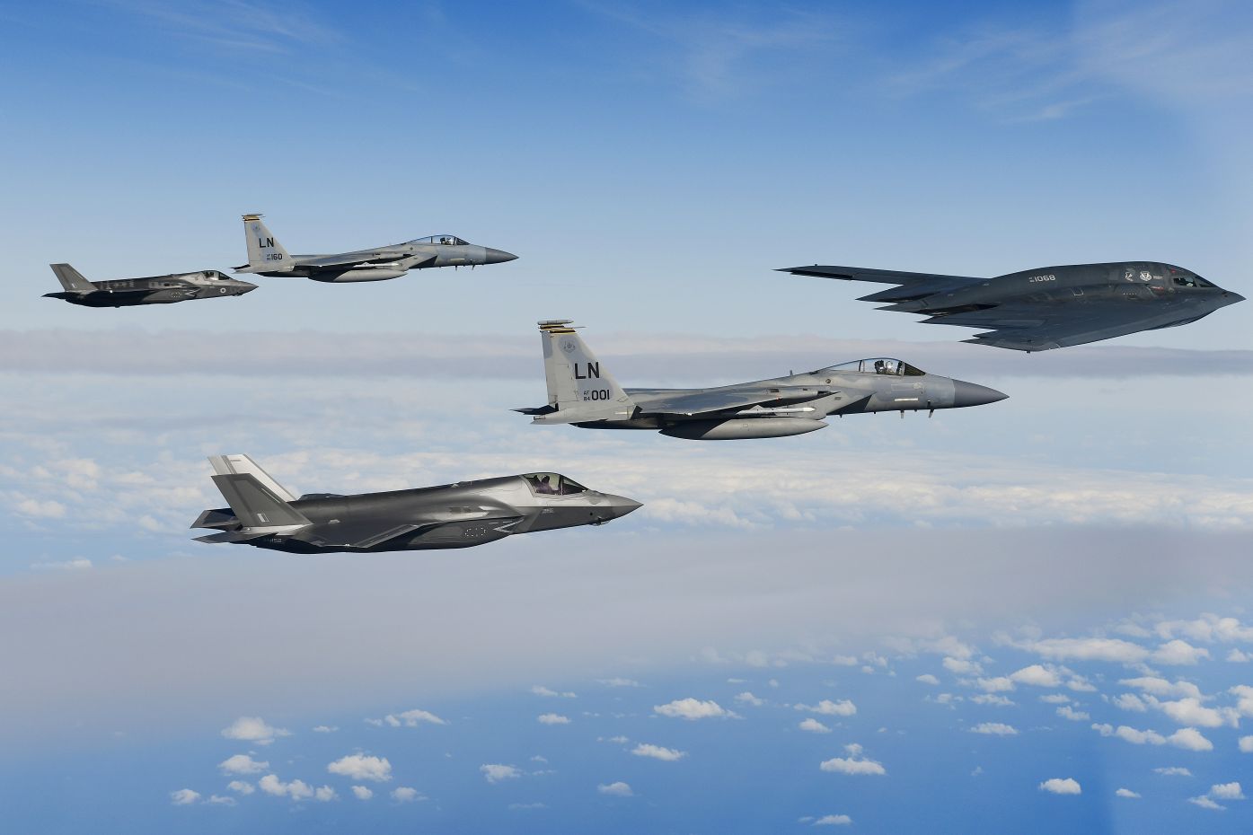 USAF B-2s, F-15Cs, and RAF F-35s, seen flying over the North Sea on 16 September, have formed strike packages. (US Air Force/Tech Sgt Matthew Plew)