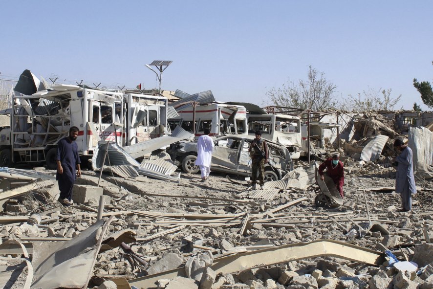 Afghan security forces investigate the site where a Taliban car bomb exploded near an intelligence services building in Qalat, Zabul Province, on 19 September. (STR/AFP/Getty Images)