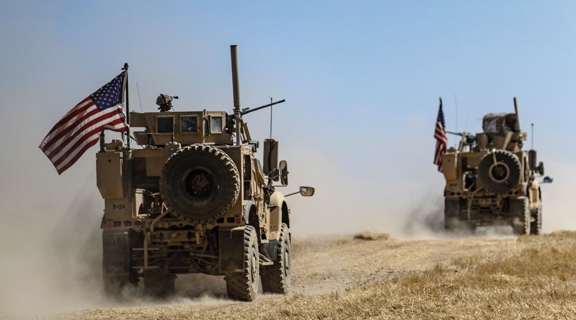 A US military convoy participates in joint patrol with Turkish troops in the Syrian village of al-Hashisha on the outskirts of Tell Abyad along the border with Turkish troops on 8 September. The US has approximately 1,000 troops inside Syria on safe zo...
