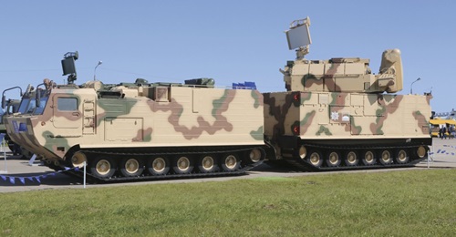 A Tor-M2DT short-range surface-to-air missile system with sand camouflage at the MAKS 2019.