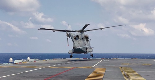 Merlin HM2 ZH826 from 820 Naval Air Squadron conducts a 'backwards' landing as part of rotary-wind development trials.