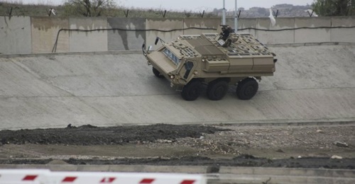 A Fuchs 2 armoured personnel carrier is seen on the test track at the Rheinmetall-Algerie facility when it was formally inaugurated by General Ahmed Gaïd Salah in February 2017.