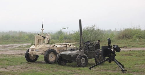 Roboneers displayed its new Camel (right) and upgraded Ironclad (left) UGVs at the Arms and Security defence exhibition on 8-11 October.